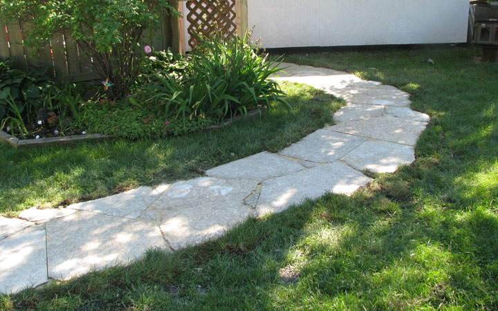 Large stones form a narrow pathway