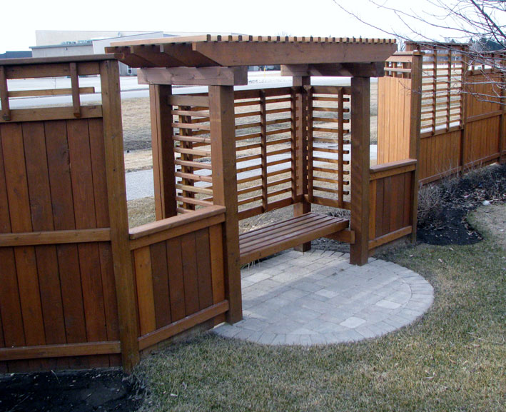 Covered bench with privacy screen on Parkland Place, Winkler