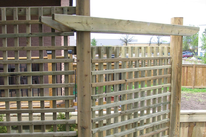Sturdy fence and privacy lattice on Tangle Ridge Cres