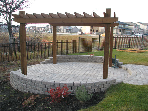 Round patio with wooden pergola on Prominence Point