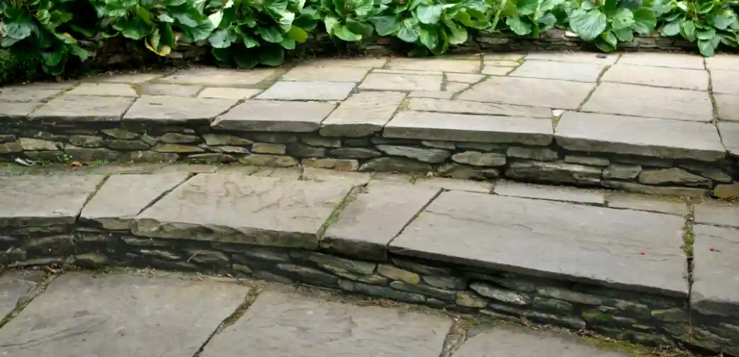 Courtyard patio with built-in brick table and outdoor furniture